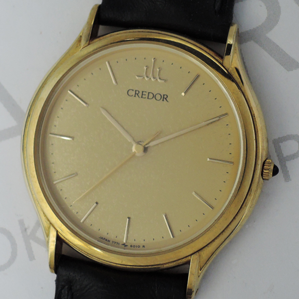 セイコーSEIKO クレドール 7771-6020 男性用腕時計 クォーツ ゴールド文字盤 18KYGx黒革 IT6032