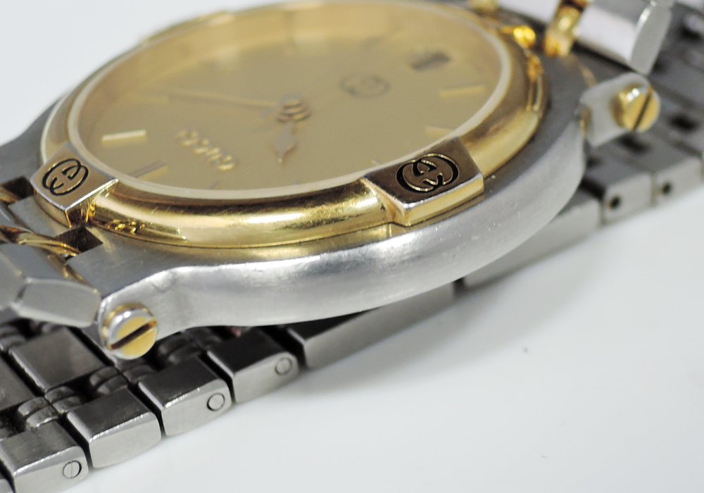 グッチ GUCCI 9000M クォーツ ユニセックス 腕時計 コンビ ゴールド文字盤 CF7646のイメージ画像