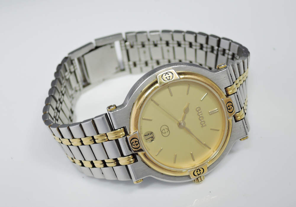 グッチ GUCCI 9000M クォーツ ユニセックス 腕時計 コンビ ゴールド文字盤 CF7646のイメージ画像