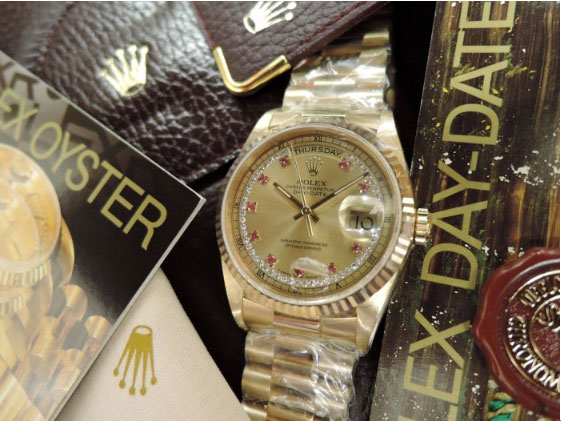 ROLEX ロレックス Ref18238LR デイデイト 10Pルビー＆取巻粒ダイヤ 金シャンパン文字盤 昔は貼って有った日本ROLEX純正裏蓋シール付！のイメージ画像