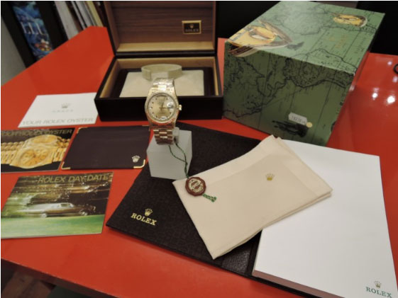ROLEX ロレックス Ref18238LR デイデイト 10Pルビー＆取巻粒ダイヤ 金シャンパン文字盤 昔は貼って有った日本ROLEX純正裏蓋シール付！のイメージ画像